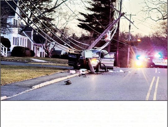 CAR STRIKES POLE