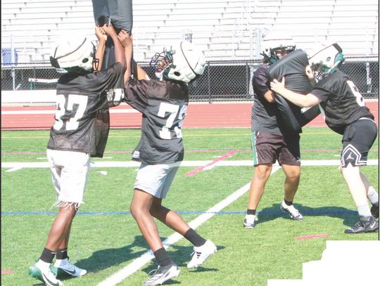 FRESHMEN FOOTBALL TEAM PREPARES