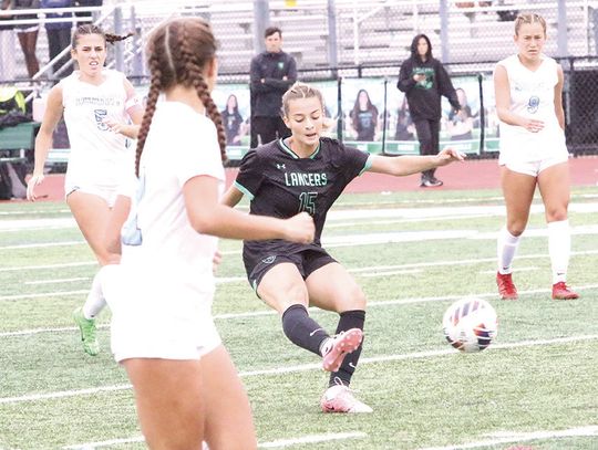 GIRLS’ VARSITY SOCCER TEAM COMPETES