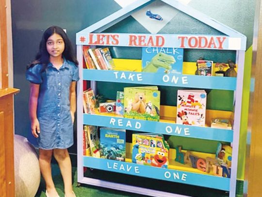 Livingston Girl Creates Lending Library