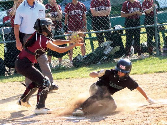 SOFTBALL TEAM DEFEATS RIDGEWOOD