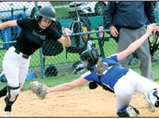 SOFTBALL WINS THREE