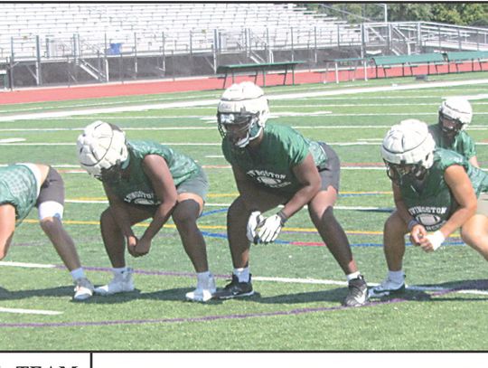 VARSITY FOOTBALL TEAM READIES FOR SEASON