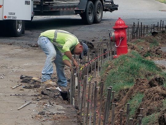 WORK ON WEST OAKWOOD AVENUE CURBS