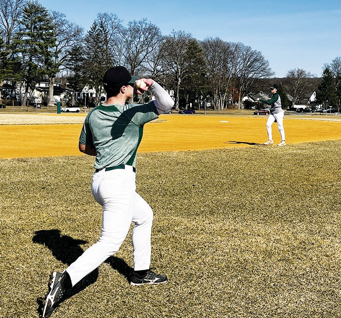 BASEBALL TEAM PRACTICES ON THE