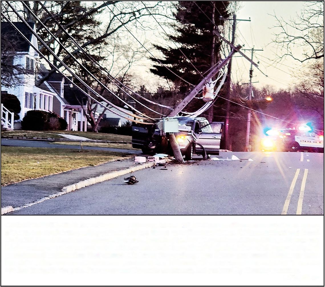 CAR STRIKES POLE