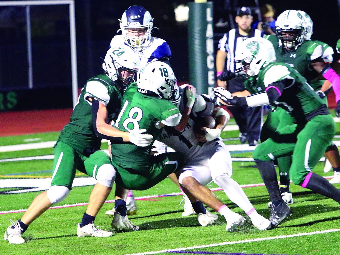 FOOTBALL TEAM FALLS TO RAMS