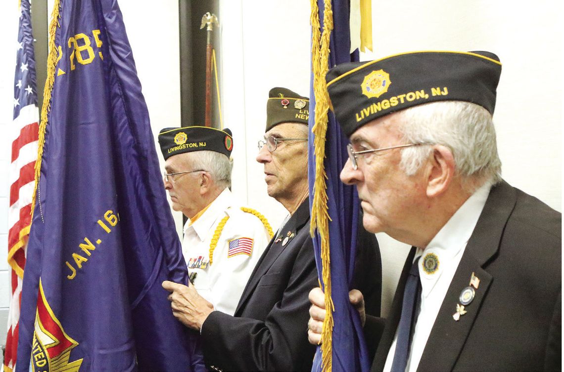 At left, veteran and Livingston High School alumnus Samir Patel leads the line of march during the posting of colors. Above, at the ceremony, are Peter Brady, Marty Halo and William Brady.