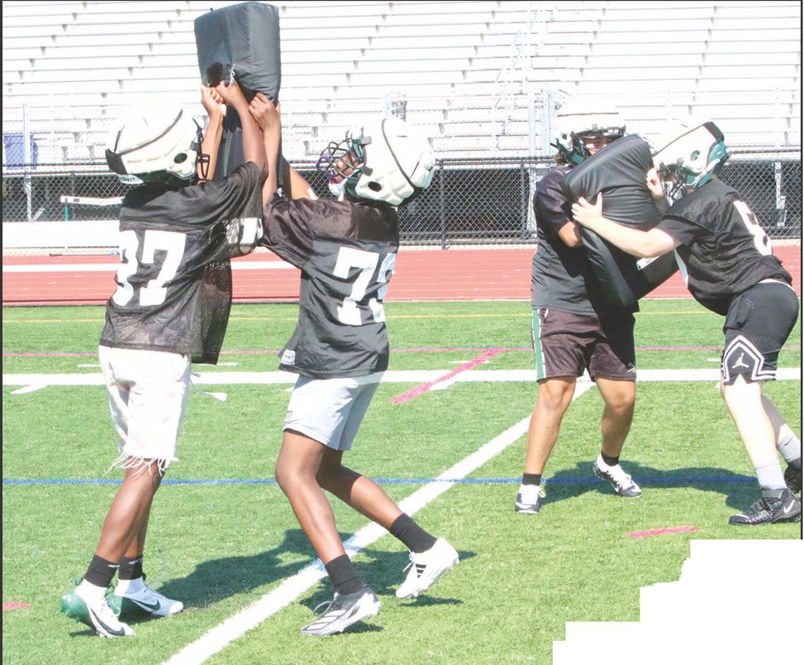 FRESHMEN FOOTBALL TEAM PREPARES