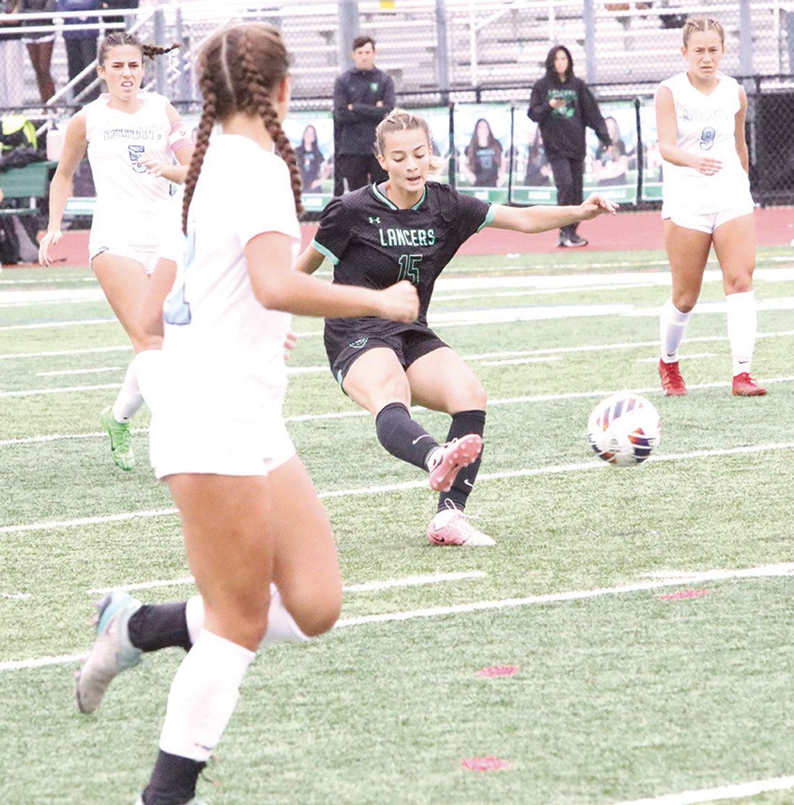 GIRLS’ VARSITY SOCCER TEAM COMPETES