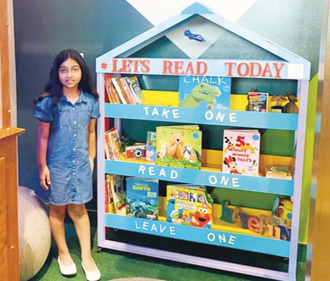 Livingston Girl Creates Lending Library